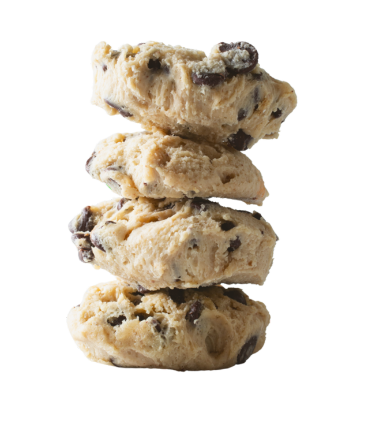 Stack of four golden-brown cookies with chocolate chips and raisins against white background