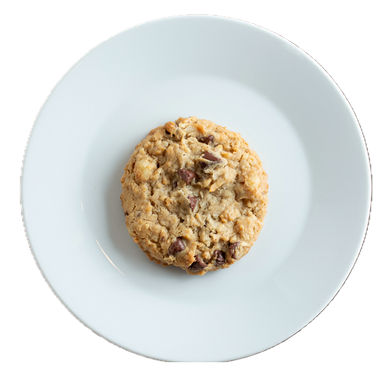 Oatmeal cookie with cranberries and nuts on white ceramic plate against white background