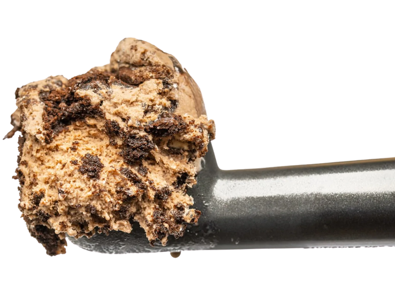 A scoop of chocolate chip cookie dough ice cream on a black spoon against a white background.