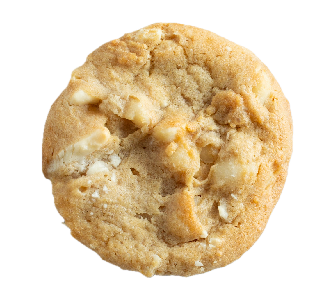 Golden brown cookie with visible white chocolate chunks and macadamia nuts on transparent background